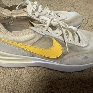 Nike Beige Sneakers with Yellow Accent